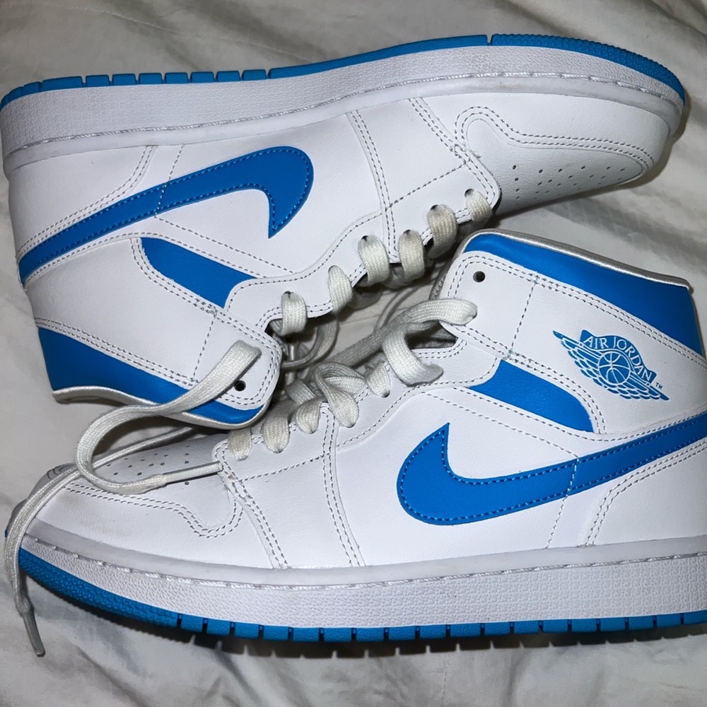 Blue and white Nike Jordan’s